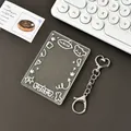Transparent glitter acrylic photocard holder with white doodle and heart clasp - White Graffiti