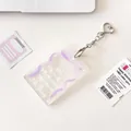 Transparent acrylic card holder with purple bow print and silver heart-shaped metal clasp - Purple