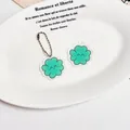 Süße grüne Acryl-Blumenanhänger mit Smiley-Gesicht und Kugelkette für Schlüssel - Grüner Lächelnder Klee