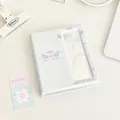 Light blue angel theme photo card binder with transparent window and wing design - Angel