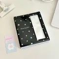 Glossy black Angel Strawberry photo card binder with star patterns and clear window - Black and White