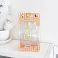 Orange striped transparent storage bag for dolls with cute bread patterns and handle - Small Yellow Bread