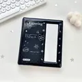 Black glossy 4-pocket card binder featuring polka dots and star patterns with a clear window - Black Graffiti