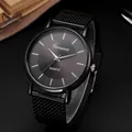All-black minimalist quartz watch for men featuring a black mesh strap and grey sunray dial - Black