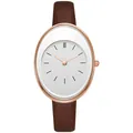 Detail of rose gold oval quartz watch with white dial and brown leather strap - Brown