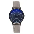 Vista de la esfera minimalista y la correa gris texturizada de este reloj de cuarzo unisex - Esfera Negra Correa Gris