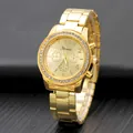 Elegant gold quartz watch with crystal-encrusted bezel and metallic link strap - Gold