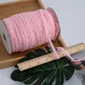 Nastro in pizzo elastico rosa a corona 1,5cm su rocchetto per artigianato fai da te - Rosa