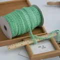 Rotolo di pizzo elastico verde menta da 1,5 cm per vestiti di bambole e decorazioni - Verde Smeraldo
