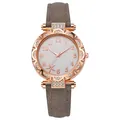 Vista detallada de la caja de reloj oro rosa con bisel de cristal y esfera con flores - Gris