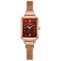Detail of rose gold mesh strap and rectangular red dial on a vintage women watch - Red