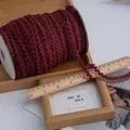 Pizzo elastico rosso scuro da 1,5cm con trama floreale per decorazioni fai-da-te - Borgogna