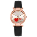 Close-up of rose gold watch face with red heart pattern and black leather strap - White Face Black Strap