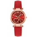 Close-up of red heart dial watch with rose gold case and frosted leather strap - Red
