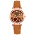 Detail of rose gold watch with brown suede strap and heart patterned brown dial - Brown