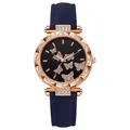 Women's quartz watch with rose gold case, blue suede strap and butterfly dial design - Blue