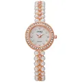 Macro view of women's watch featuring a mother-of-pearl dial and crystal-encrusted bezel - Rose Gold