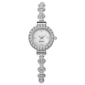 Detailed close-up of clover shaped silver watch links with sparkling crystals and diamonds - Silver
