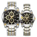 Primer plano de relojes bicolores de negocios para parejas con esferas negras mate - Pareja Plata Oro Negro