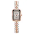 Detailed macro view of rectangle gold watch face with pearl bracelet and inlaid crystals - Rose Gold
