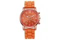 Detail of orange quartz watch dial with roman numerals and textured silicone strap - Orange