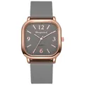 Detail view of square quartz watch with grey textured dial and rose gold metal casing - Gray
