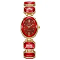 Gros plan d'une montre à quartz dorée avec cadran ovale rouge et cristaux rouges - Rouge