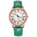 Detailed macro view of white watch dial with Roman numerals and crystal-encrusted gold bezel - Green