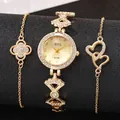 Close-up of gold quartz watch set with sparkling rhinestone bracelets and clover charms - Scale Clover Gold (A729)