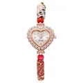 Detailed view of heart-shaped quartz watch with crystal bezel and braided strap - White