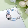 Detail of quartz wristwatch featuring pink dial and colorful bead charm bracelet strap - Sunray Pink