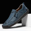 Hand-stitched dark blue leather loafers for men featuring decorative zippers and rubber soles - EU 38 / Blue