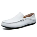 Classic white leather loafers for men with rubber soles shown from a 45-degree side angle - EU 38 / White