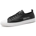 Classic black leather low-top casual sneakers for men with white sole and social man print - EU 39 / Black