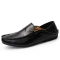 Classic black leather loafers with hand-stitched details and comfortable rubber soles - EU 38 / Black