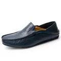 Men's navy blue leather loafers with pebbled texture and classic moccasin stitching - Blue