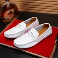 Mens white pebbled leather loafers with woven lace detail on luxury red velvet display - 38 / Casual Loafers (9959) / White