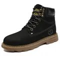 Black leather high-top work boot with thick rubber sole and yellow tongue detail - Black Fleece Lined