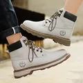 Light gray high-top leather work boots with sport logo and durable rubber soles - Sand