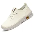 Handmade cream flat shoes for women with thick wave rubber sole and stitching detail - EU 35 / White