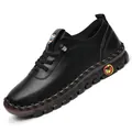 Women's black leather slip-on shoes with soft soles and handmade stitching detail - EU 35 / Black