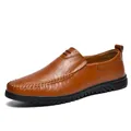 Premium brown leather loafer for men featuring hand-stitched details and soft rubber sole - EU 38 / Red Brown