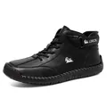 Black high-top leather boots with textured pebble grain finish and hand-stitched soles - EU 38 / Black