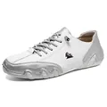 Fashionable low-top casual sneakers in white and silver with goat logo and wavy rubber sole - White Silver