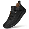 Bottines Martin en cuir noir pour homme avec coutures blanches et bout en caoutchouc - 38 / Noir