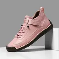 Chaussures en cuir rose cousues main avec coutures apparentes et bride ajustable - 36 / Rose