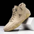 Men's khaki high-top suede boots with rubber sole and side logo in a side-profile view - EU 36 / Beige