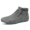 Detail of gray leather boots featuring side zipper and knitted deer pattern ankle cuff - 38 / Vintage / Gray