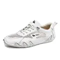 Witte ademende herensneakers van mesh met leren details en een logo op de zijkant - Wit