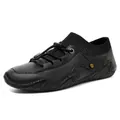 Men's black casual loafer featuring a toggle lace system and wave-patterned non-slip sole - EU 38 / Black
